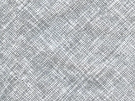 Pale cotton–linen basketweave photographed close, showing the open grid of the weave.