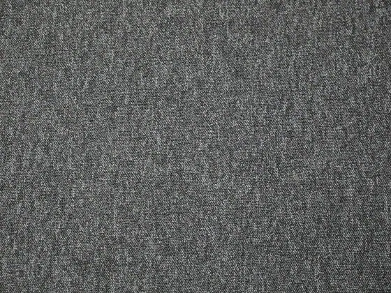 Grey cotton twill photographed close, showing the diagonal weave.